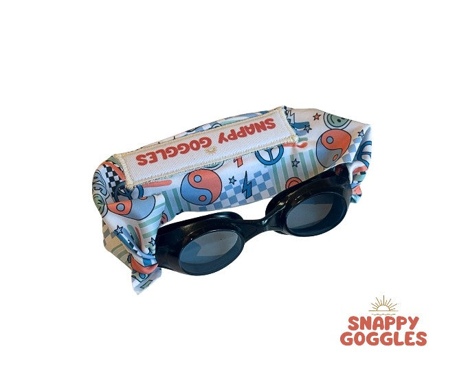 black frame swim goggles with adjustable, fabric strap featuring peace signs, ying yangs, checkers and stars – Snappy Goggles