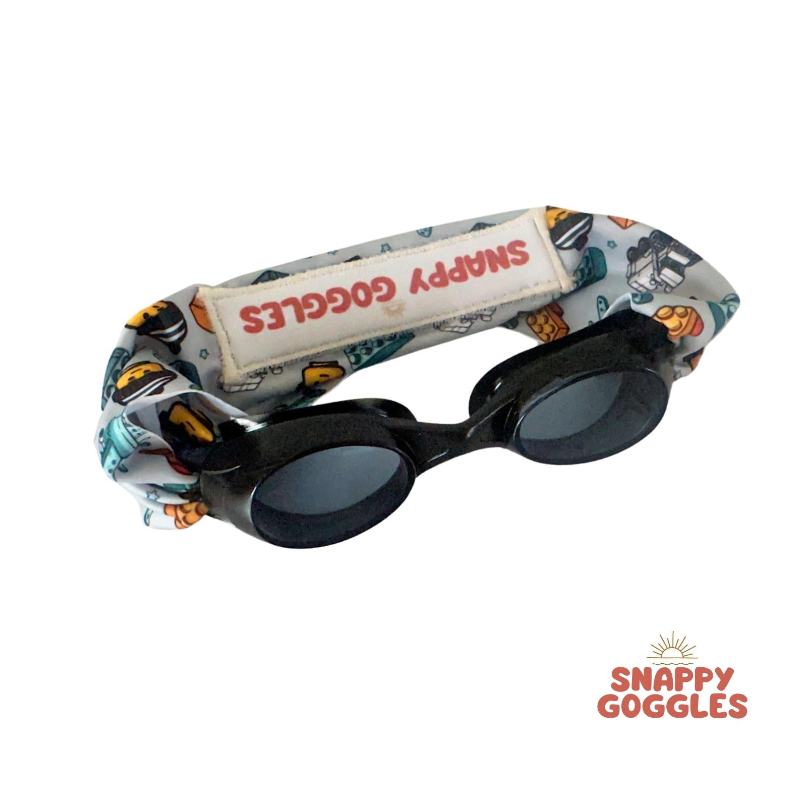 blue Aqua Block boys swim goggles with fabric adjustable strap and floatable swim goggles – Snappy Goggles