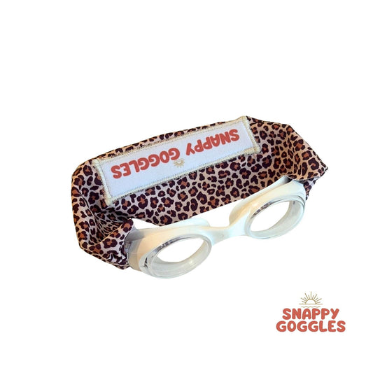white frame goggles with leopard pattern kids swim goggles with adjustable, fabric strap – Snappy Goggles