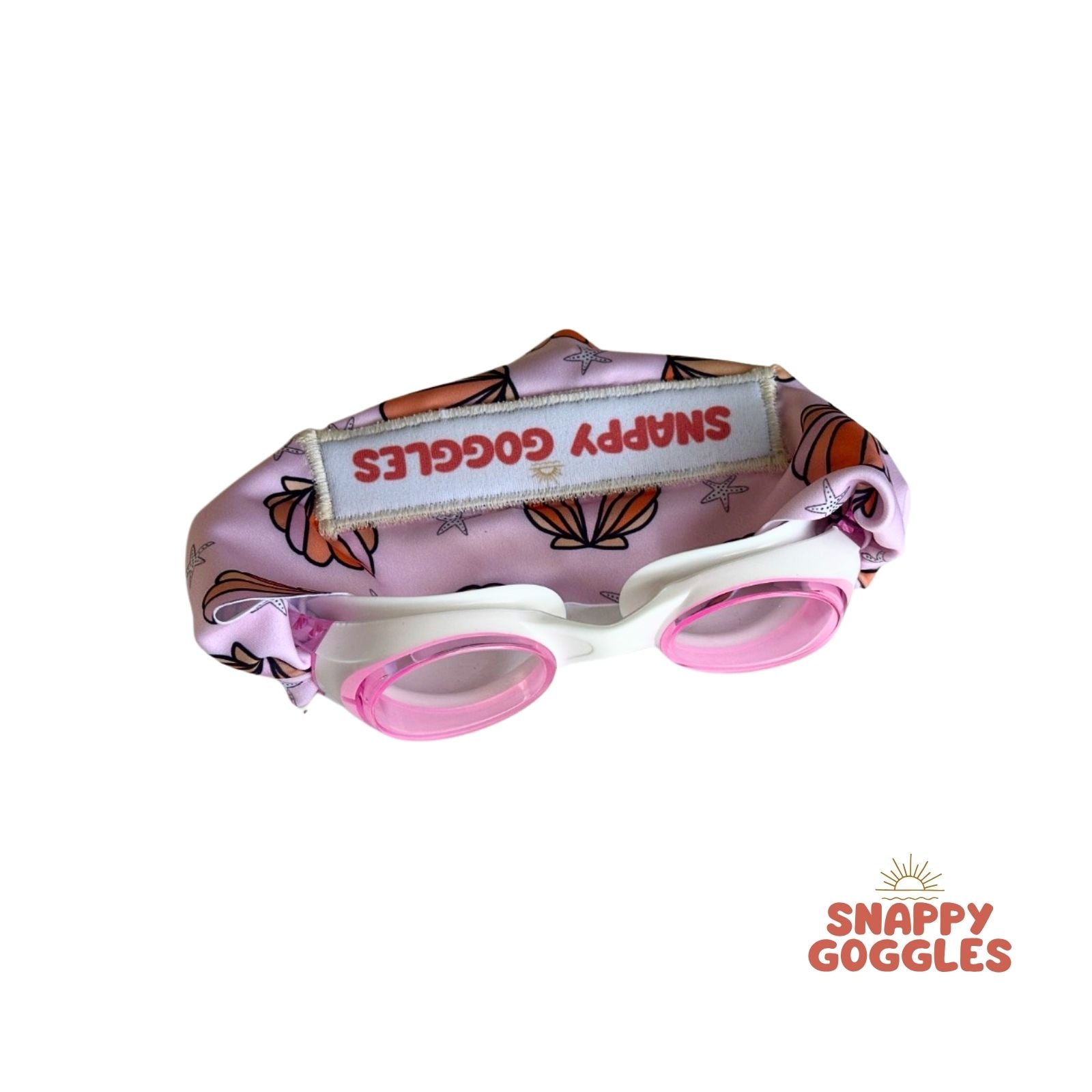 pink and orange seashell and startfish  kids swim goggles with soft fabric adjustable strap, floatable swim goggles – Snappy Goggles