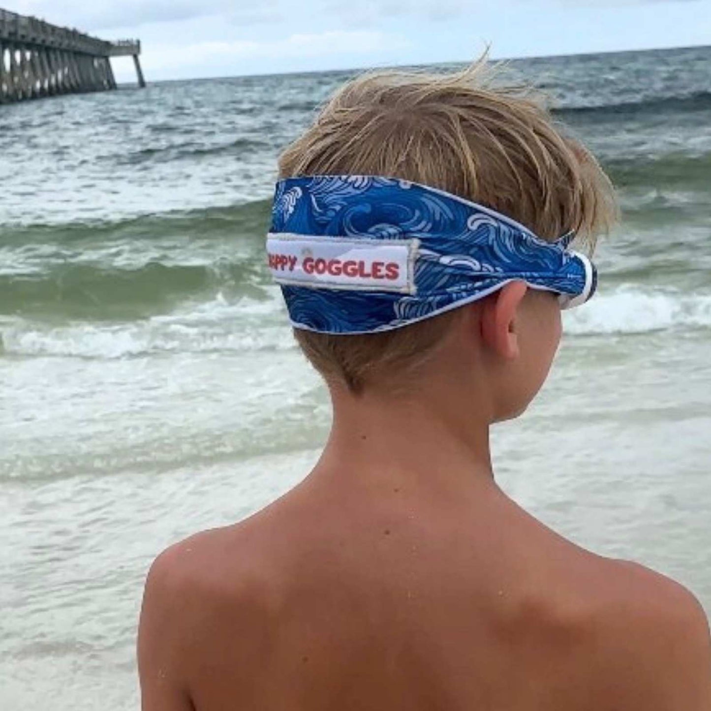 blue tidal waves kids swim goggles side view with soft fabric strap goggles at the beach– Snappy Goggles